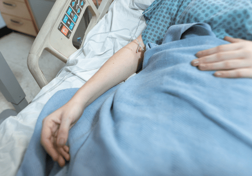 Workplace injury attorneys in Carrollton Georgia Smith Wallis and Scott - Image of a person in a hospital bed