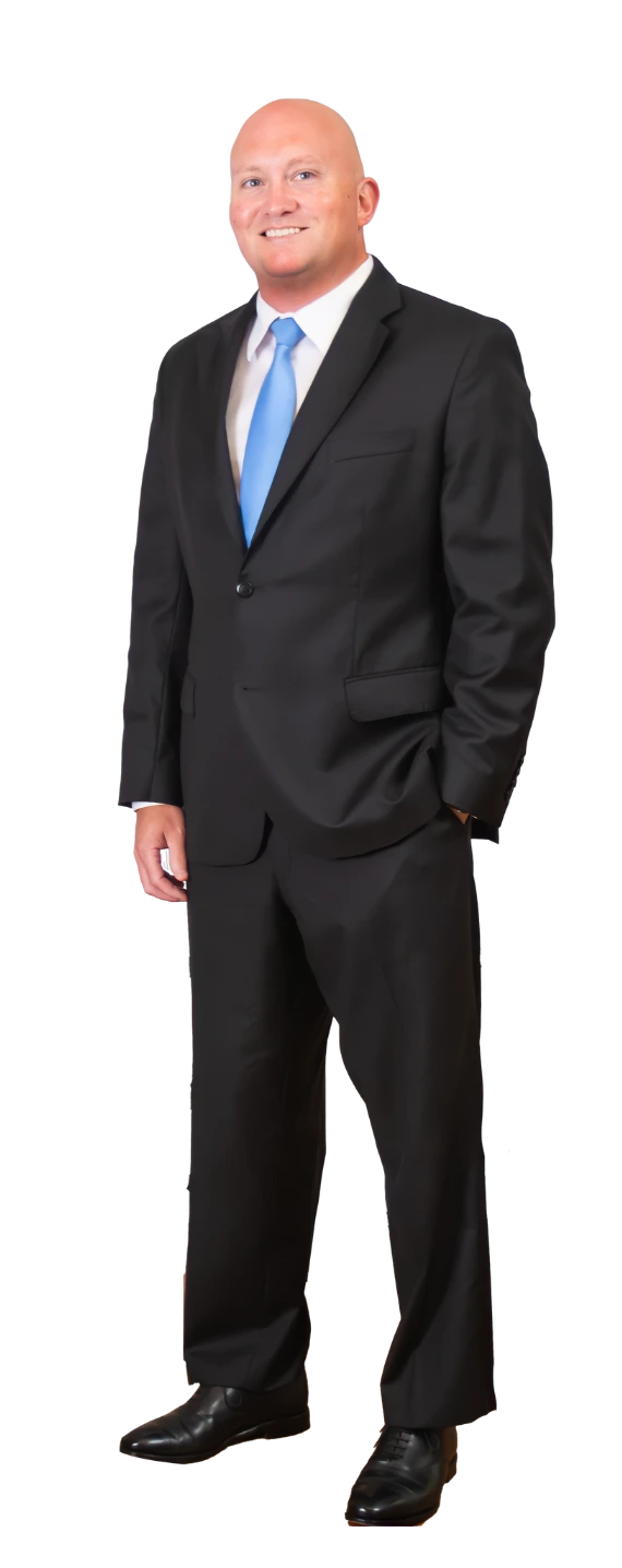 Carrollton Attorney Joseph Brown- SWS Accident & Injury Lawyers - Image of attorney Joseph Brown standing in a suit