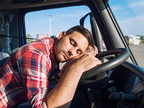 Trucking Accident Attorneys at SWS law Firm in Carrollton - Trucker asleep at the wheel inside of his cab