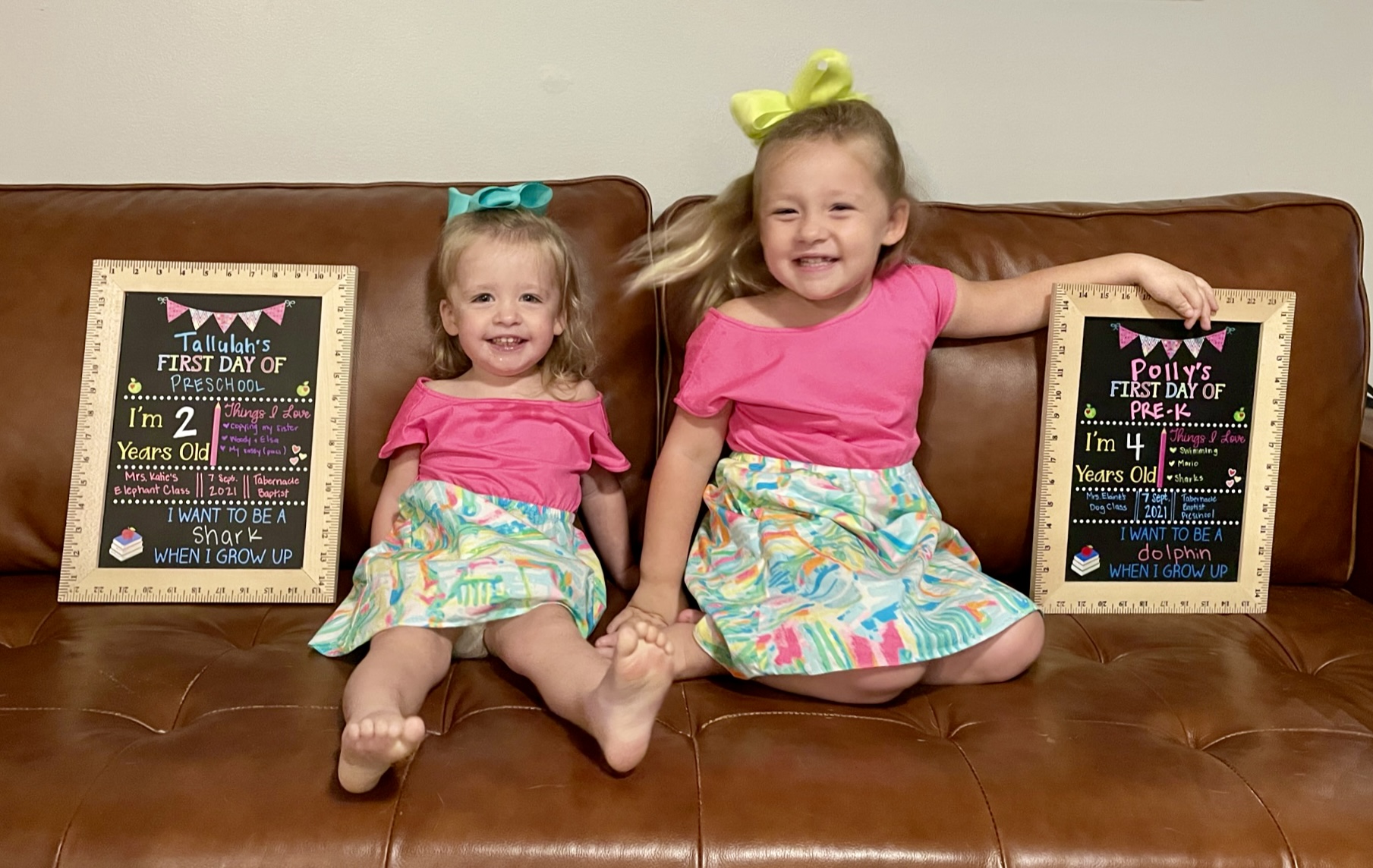 Back To School Safety Tips from your Carrollton Georgia Accident nd Injury Attorneys - Two young girls seated on a couch with chalkboards